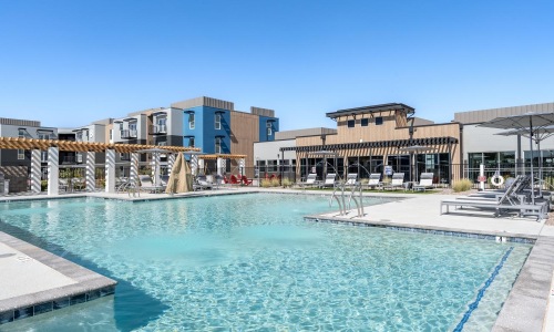 view of the pool and cabanas