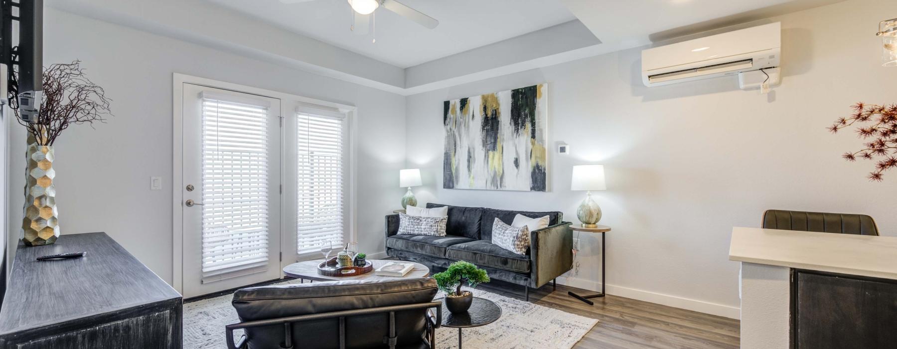 a living room with a large rug